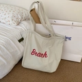 Off-white Kordelzug-Tote-Bag mit rotem Beach-Aufdruck aus leichtem Material - Beigegrau mit Beach-Print