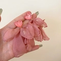 Detail of pink resin heart earrings with delicate long fabric flower tassels on hand - Heart Style (1#)