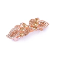 Close-up of alloy spring hair clip with rhinestones in rose gold floral design - Style D / Champagne