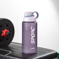 Purple frosted sports water bottle placed on fitness equipment in a gym setting - 800ML / Matte Purple