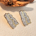 Artistic wrinkled mixed metal earrings with silver body and gold edge finish - Irregular Sheet Liquid Metal Texture