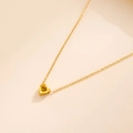 Golden titanium steel heart necklace featuring a yellow birthstone zircon pendant - November - Citrine