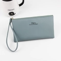 Mist blue long zipper wallet for women made of textured PU leather with wrist strap - Light Blue