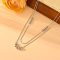 Detail view of double-layer silver snake chain necklace with smooth metallic beads - Steel Color Double-layer Necklace