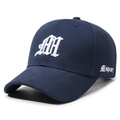 Navy blue cotton baseball cap with white gothic letter M embroidery in a variant view - Adjustable / Navy Blue