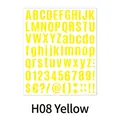 Macro view of yellow adhesive vinyl alphabet and number stickers for DIY crafts - Yellow