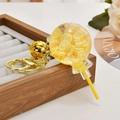Lollipop acrylic liquid keychain featuring lemon slices with golden bell accessory - Fruit Lollipop [Lemon Yellow]