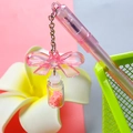 Cute pink translucent gel pen with a delicate bow and glitter bottle charm hanging - Butterfly Drift Bottle - Pink