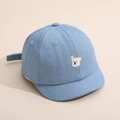 Detailed close-up of baby denim baseball cap featuring white bear embroidery and stitching - 50cm (1-3 Years) / Blue
