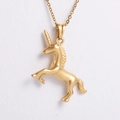 Macro detail of a golden sandblasted unicorn pendant necklace with a matte finish - Gold (With 450mm Chain)