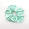 Elegant mint green satin scrunchie with a silky finish and soft fabric texture - Mint Green