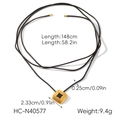 Detail view of square gold pendant with black inlay and cord chain specifications - Black Cord Square Pendant Necklace (HC-N40577)