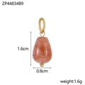 Detail view of pink natural stone drop pendant with 1.6cm height and gold ring attachment - Strawberry Quartz Color