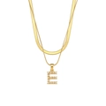 Double-layered gold chain necklace featuring a pearl-inlaid capital letter E pendant - Letter E