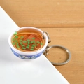 Miniature blue and white porcelain bowl ramen keychain with realistic noodles and charms - Pork Belly Noodles