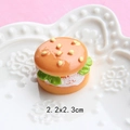 Macro detail of miniature resin hamburger model 2.2x2.3cm on a ceramic plate - 3D Sesame Veggie Burger
