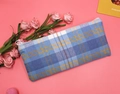 Detailed close-up of blue and yellow plaid canvas pencil case with a round zipper puller - Blue & Yellow Plaid