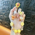 Handmade yellow Capybara beaded keychain with stars and flowers phone strap charm - Capybara Beaded Charm / Random Hand-painted Beads / Yellow