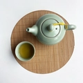Celadon cracked glaze porcelain teapot and cup set on a bamboo mat for Kung Fu tea - Carbonized Round 20cm