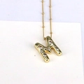 18k gold bubble letter M necklace with zircons and satellite chain on white background - M