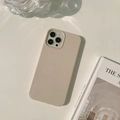 Detail of matte apricot silicone case for iPhone with water ripple shadows on surface - Jelly Khaki / 15promax