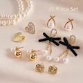 Set di 10 orecchini con fiocchi di velluto e cuori dorati su sfondo di raso - Perno in Argento - Oro (Set da 10 pezzi)