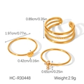 Three-piece gold titanium steel ring set with hollow design, heart detail, and zircon cross - Heart and Cross 3-Piece Set (HC-R30448)