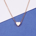 Polished rose gold heart pendant necklace on minimalist chain over bicolored backdrop - Rose Gold (MP272-1)