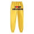 Yellow sports joggers with 'I LOVE MY GIRLFRIEND' heart print and elastic cuffs - S / Yellow (Girlfriend)