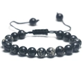 Adjustable woven bracelet featuring black map stone beads with natural marble texture - Black Turquoise