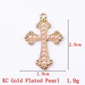Cross pendant in KC gold finish featuring white circular pearls and measurement details - 11778 Gold