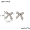 Macro shot of silver bow earrings showing detailed texture and 3.1cm by 2.9cm dimensions - HE47184AW0 Silver Striped Bow