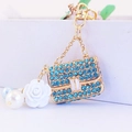 Golden camellia bag keychain with blue rhinestones and white pearls for women - Individual Packaging / Blue