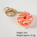 Pink orange donut keychain charm with white icing and 4.5cm diameter size detail - 033 Watermelon Red - Gold 8-clasp