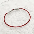 Tennis bracelet in silver finish featuring vibrant red cubic zirconia stones and clasps - Small / Bright Red