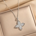 Titanium steel four-leaf clover necklace with sparkling cubic zirconia on a jewelry box - Rhombus Clover (8841) / Silver