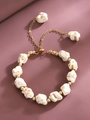 Bow pearl bracelet with irregular white turquoise stones and adjustable gold chain - White Irregular Stone Bolo Bracelet (K-625)