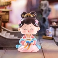 Cartoon Tang Dynasty lady resin figurine in pink and blue robe holding a blue scroll - Reading