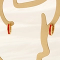 Macro view of 18K gold plated hoop earrings with red enamel on a decorative stand - 3*11mm / Red