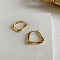 Polished gold geometric earrings with minimalist irregular twisted metal design - Gold Twisted Irregular Hoop (E050)