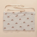Detail of double-pocket cotton crib organizer with rainbow print and tie-on straps - Grey Rainbow