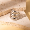 Minimalist silver multi-layer wrap ring in polished titanium steel on beige stone - Steel Color 13
