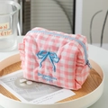 Pink plaid cosmetic bag featuring a blue bow embroidery and light blue zipper closure - Pink Plaid with Bow