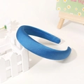 Detail of padded royal blue satin headband with thick sponge and inner fabric label - Peacock Blue