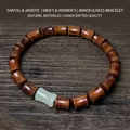 Chinese style bracelet featuring dumbbell-shaped dark sandalwood and green jade beads - 8mm Bamboo Joint With Faux Jade