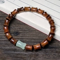Chinese style bracelet featuring dumbbell-shaped dark sandalwood and green jade beads - 8mm Bamboo Joint With Faux Jade
