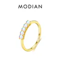 Elegant S925 sterling silver ring with five iridescent moonstones in gold finish - US Size 5 / Gold