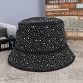 Black bucket hat with sparkling rhinestones decoration shown in a stylish studio setting - M (56-58cm) / Black/White Zirconia