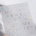 Autocollants ongles papillon argentés holographiques avec effet laser M-720 - Papillon Argent Aurore (M-720)