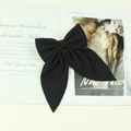 Handgemaakte zwarte strik haarclip op tijdschriften voor een elegante en stijlvolle look - Zwart